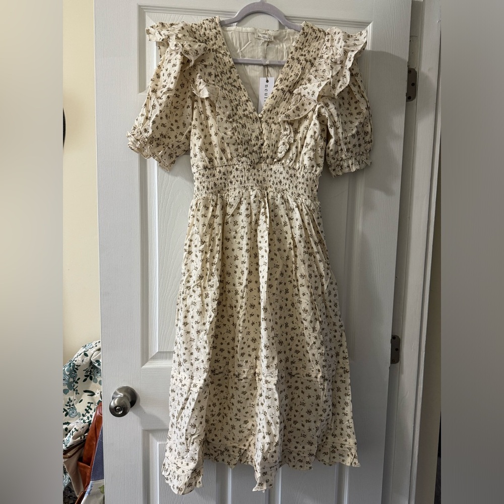 ISO size Large to trade for this size Medium Neuflora Lila dress